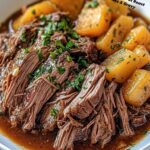Tender Slow Cooker Pot Roast with Potatoes & Gravy!