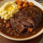 Pot Roast with Gravy Over Creamy Mashed Potatoes